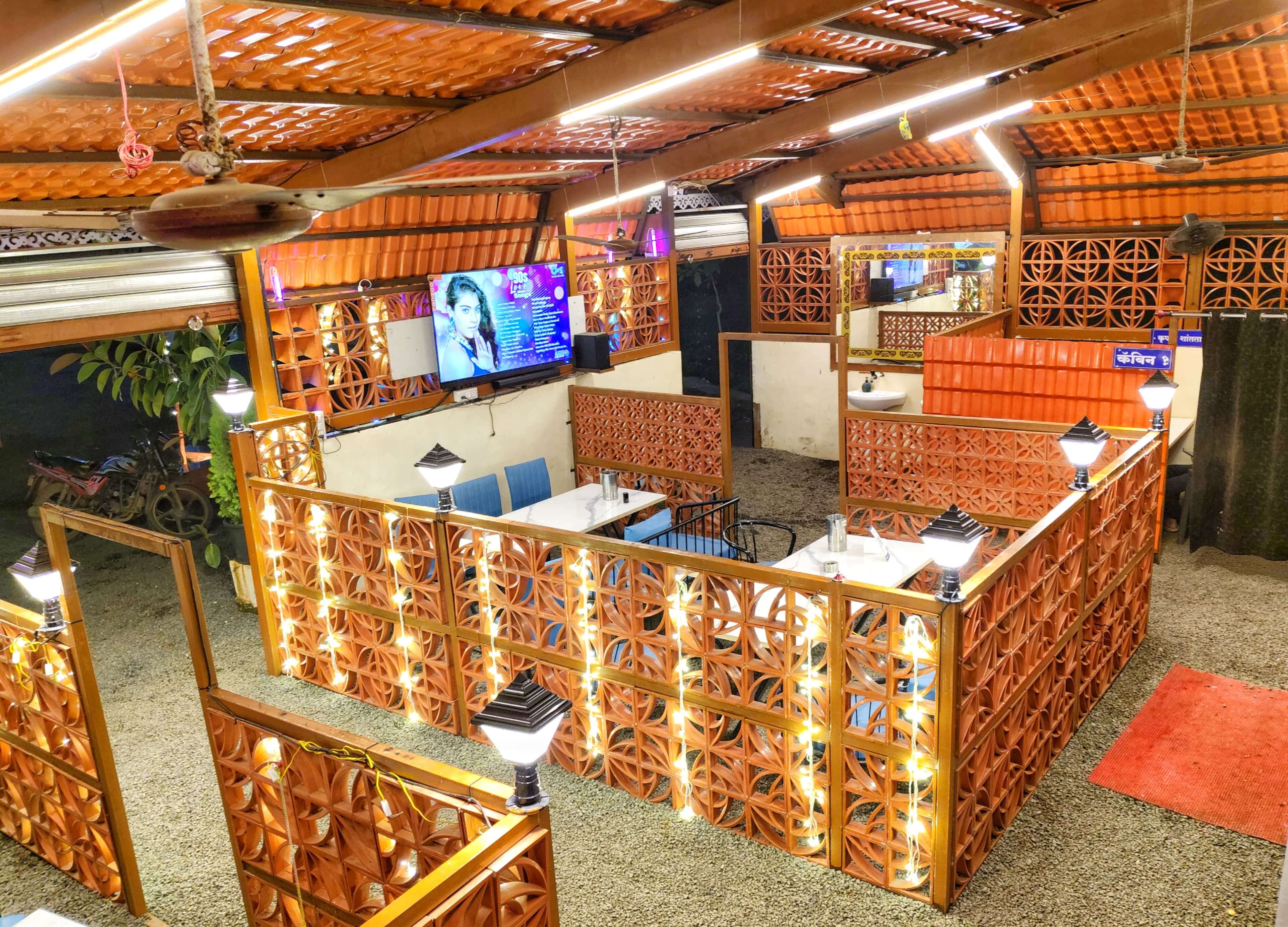 Night view of decorated dining booths from above